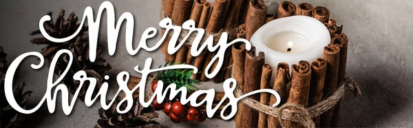 Decorated Candles Cinnamon Sticks Pine Cones Merry Christmas Lettering Banner — Stock Photo, Image