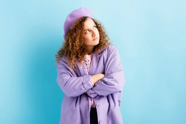 Offended Woman Beret Looking Away While Standing Crossed Arms Blue — Stock Photo, Image