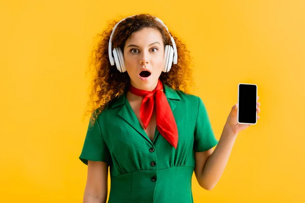 Cheerful Woman Wireless Headphones Holding Smartphone Blank Screen Isolated Yellow — Stock Photo, Image