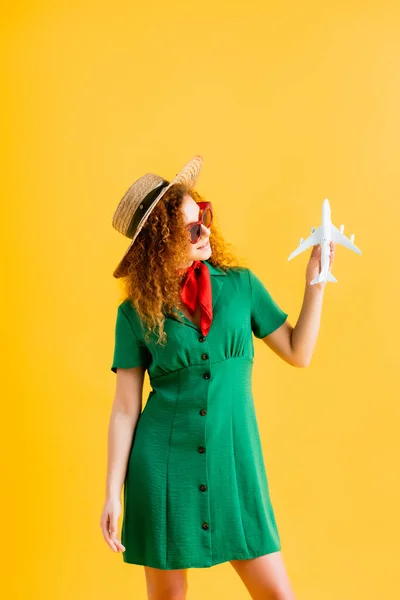 Happy Woman Straw Hat Sunglasses Dress Holding Toy Plane Yellow — Stock Photo, Image