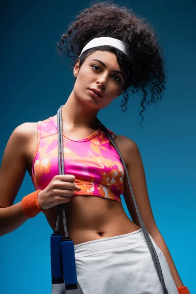 Curly Young Woman Standing Skipping Rope Blue — Stock Photo, Image