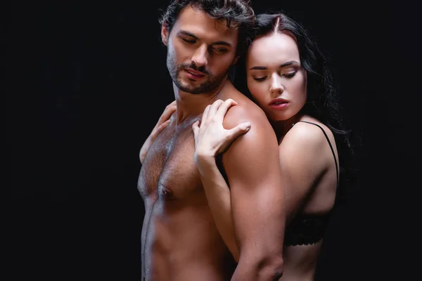 Seductive Brunette Woman Embracing Shoulders Sexy Man Muscular Torso Isolated — Stock Photo, Image