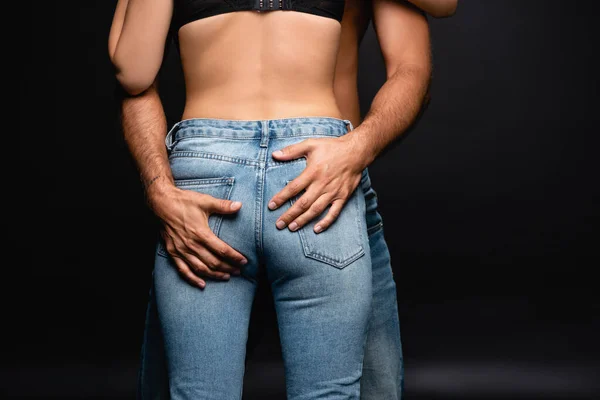 Partial View Man Touching Buttocks Woman Jeans Black — Stock Photo, Image