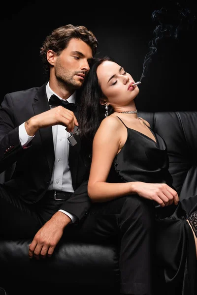 Seductive Woman Closed Eyes Leaning Elegant Man Holding Lighter Isolated — Stock Photo, Image