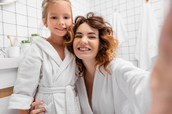 Smiling Mother Hugging Child Looking Camera Bathroom — Stock Photo, Image