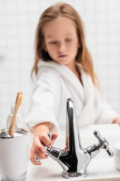 Girl Opening Water Sink Bathroom Blurred Background — Stock Photo, Image