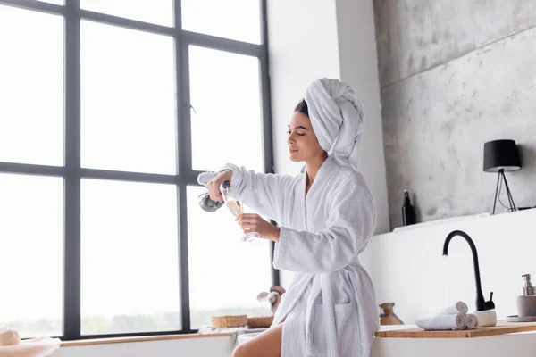 Woman Towel Bathrobe Pouring Champagne Bathroom — Stock Photo, Image