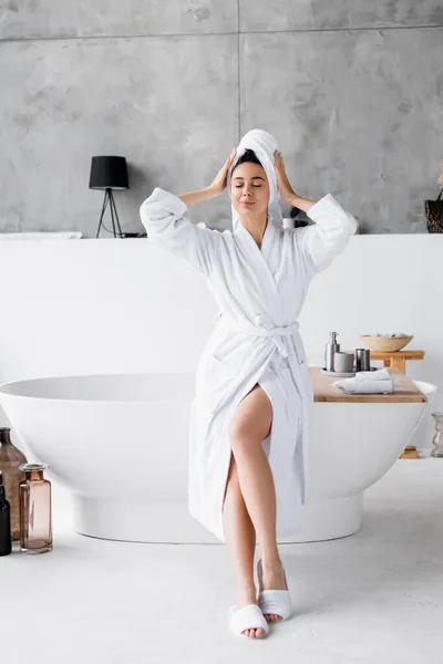 Young Woman White Bathrobe Towel Sitting Closed Eyes Bathtub — Stock Photo, Image