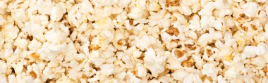 top view of airy crunchy popcorn, banner, cinema concept clipart