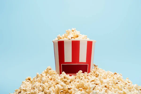 Striped Paper Bucket Crunchy Popcorn Isolated Blue Cinema Concept — Stock Photo, Image