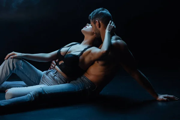 Muscular Man Jeans Kissing Neck Sexy Woman Black Background Smoke — Stock Photo, Image