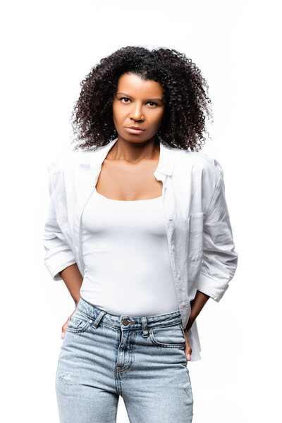 African american woman in shirt looking at camera isolated on white