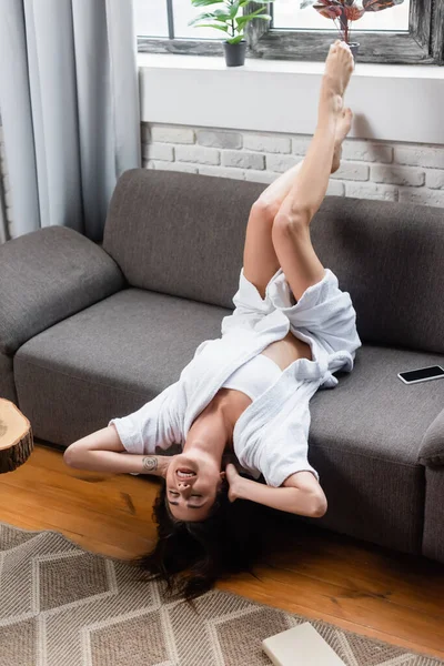 Young Adult Woman Resting Legs Air Grey Couch Home — Stock Photo, Image