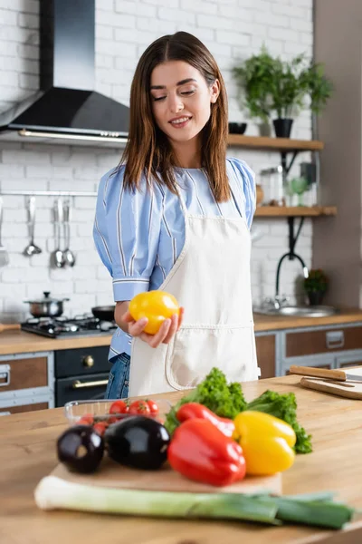 Attractive Young Adult Woman Holding Yellow Pepper Hand Kitchen — Stock Photo, Image