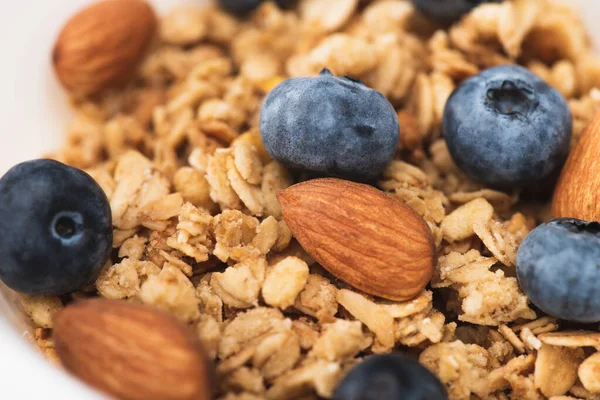 Delicious granola with nuts and blueberry — Stock Photo