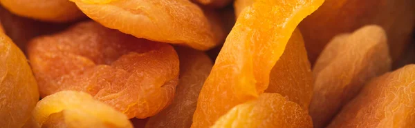Gros plan de délicieux fond d'abricots secs, bannière — Photo de stock