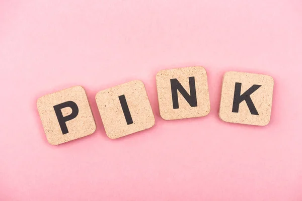 Top view of word pink on cubes — Stock Photo