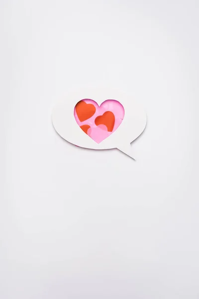 Top view of speech bubble with hearts on white background — Stock Photo