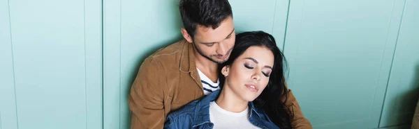 Young man near brunette girlfriend with closed eyes, banner — Stock Photo