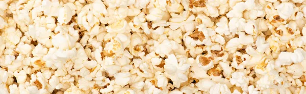 Top view of airy crunchy popcorn, banner, cinema concept — Stock Photo