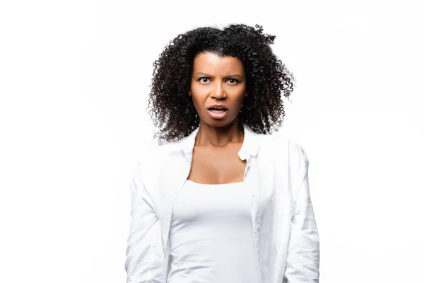 Confused african american woman looking at camera isolated on white — Stock Photo