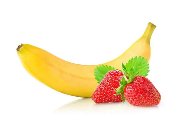 Ripe fresh banana and juicy strawberry with green leaf — Stock Photo, Image