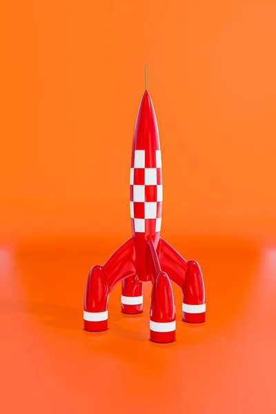 橙色背景下分离的空间火箭 — 图库照片