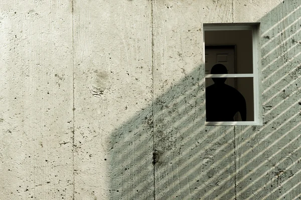 Silueta en la ventana — Foto de Stock