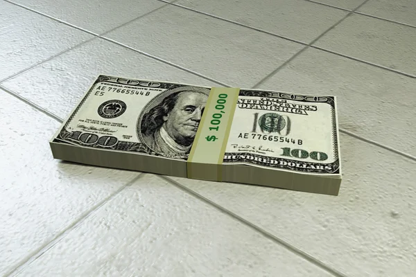Стек доллара на бетонном полу — стоковое фото