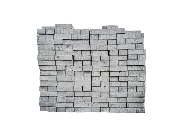 白色背景上隔离的堆放的灰色硅酸盐砖 — 图库照片