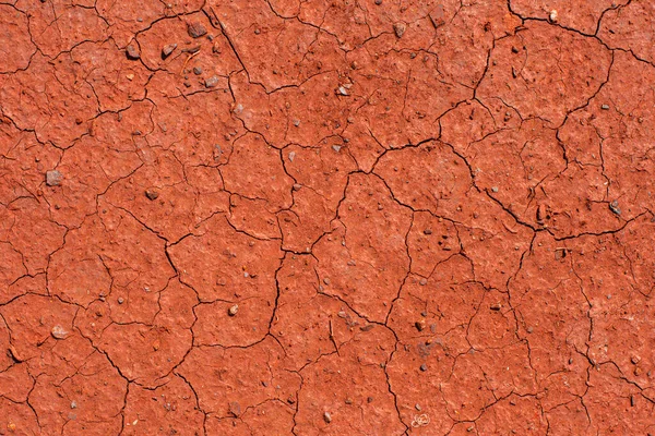 Röd Torkad Sprucken Jord Jorden Täckt Med Rött Damm Från — Stockfoto