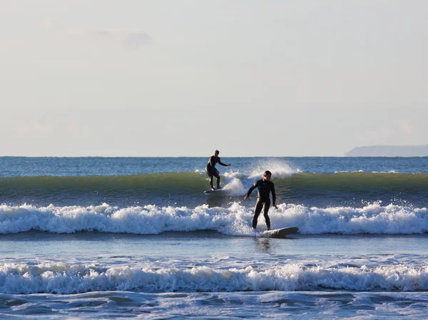 Surfing Unison — Stockfoto