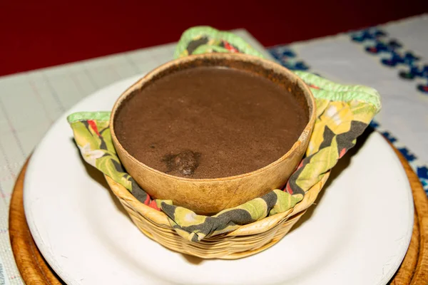Meksika, Chiapas 'tan geleneksel bir pozol içeceği. Kakao ve mısır tanelerinden yapılmış.