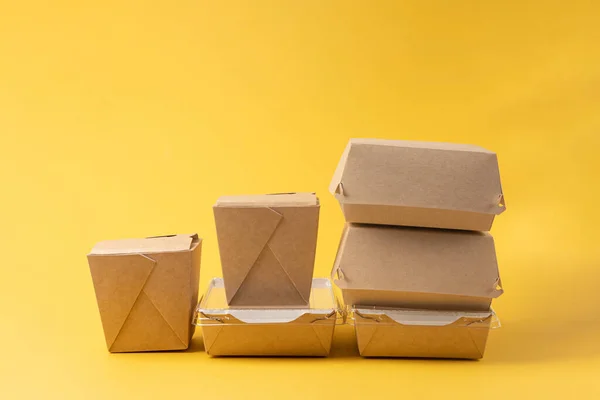 Disposable Food Delivery Boxes Yellow Background — Stock Photo, Image
