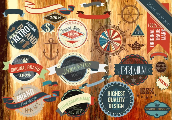 Collection of vector vintage labels on wooden texture — Stock Vector