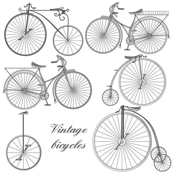 Set of vector engraved bicycles for design — Stock Vector