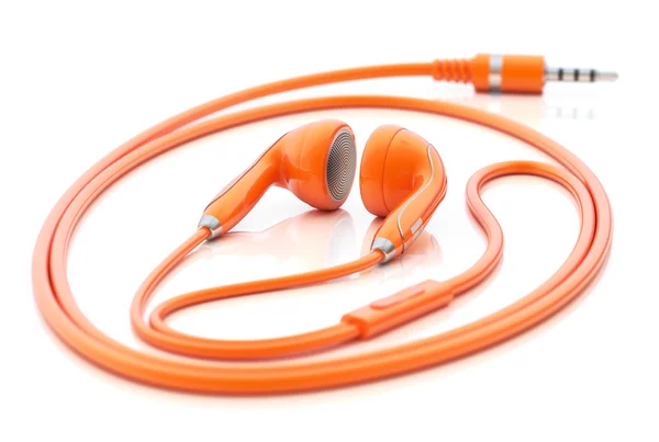 Modern orange earphones — Stock Photo, Image