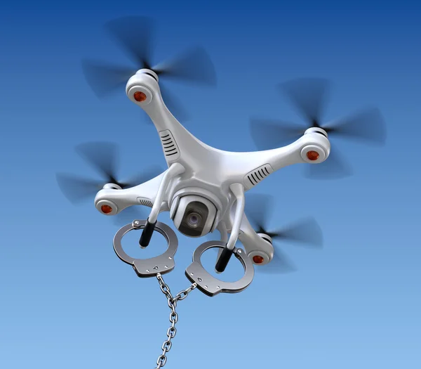 Quadrocopter drone with handcuffs — Stock Photo, Image