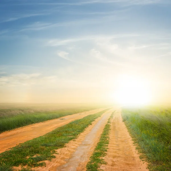 Rural ground road at the sunset — Stock Photo, Image