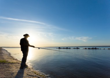 gün batımında Nehri yakınında Fisher