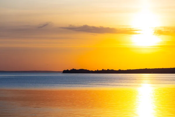 Dramatic sunset over a river — Stock Photo, Image