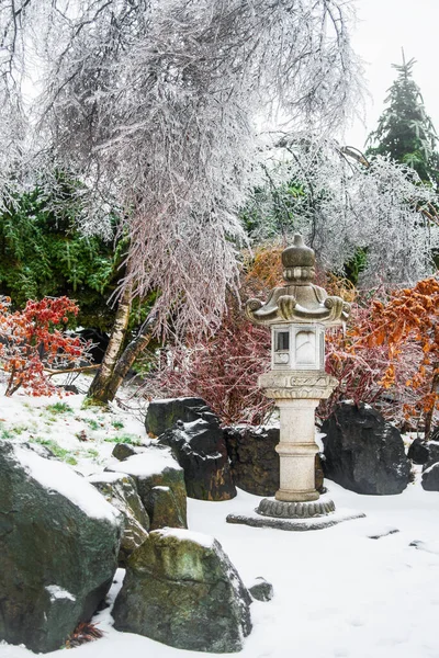 Japanese rock garden after a winter ice storm.