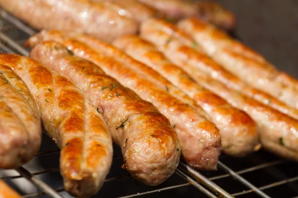 Sausages  on a grill — Stock Photo, Image