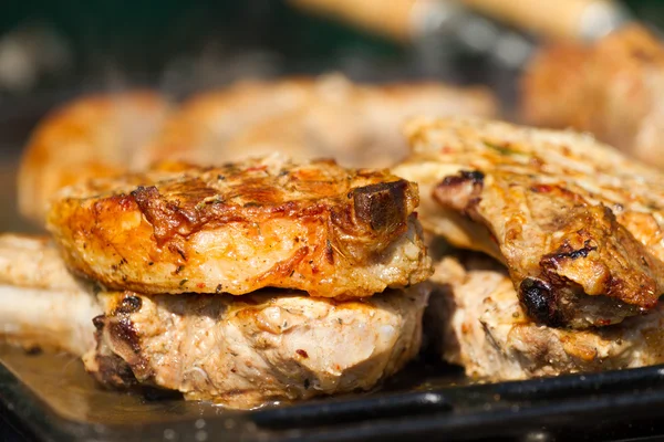 Fried meat on a grill — Stock Photo, Image