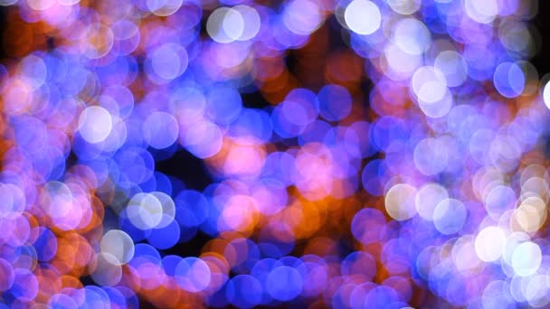 Bokeh colorido de un árbol de Navidad — Vídeos de Stock