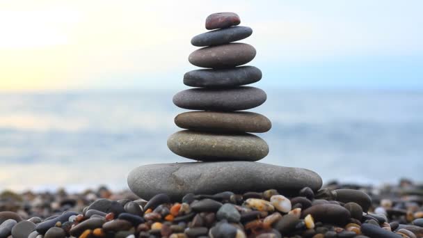 Stack of stones at sunrise — Stock Video