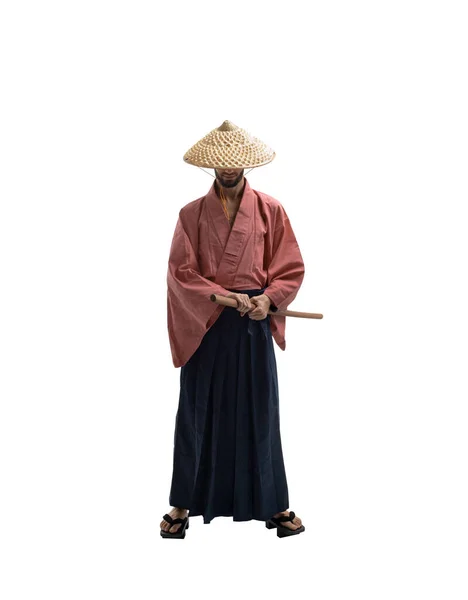 一名身穿历史制服的日本武士 身穿嘉年华剑 背景为白色 与外界隔绝 — 图库照片