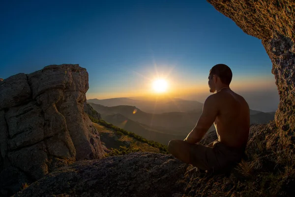 hiker yogi meditate on beauty mountain landscape background, holiday recreation traveling concept, horizontal photo