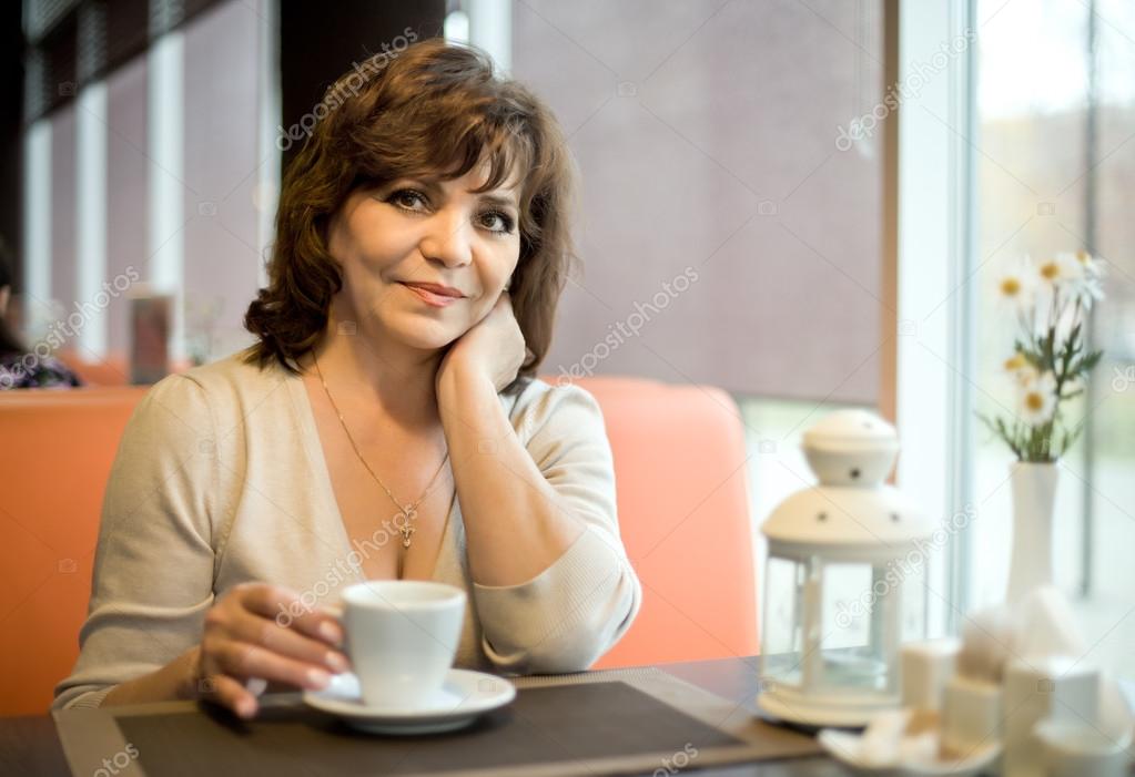 mature woman in Cafe