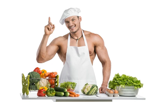Homem fisiculturista cozinheiro — Fotografia de Stock
